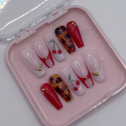 Extensions d'ongles press on Dolce Cerises 3D de Onailsbymanon, design floral coloré et détaillé pour embellir les ongles.